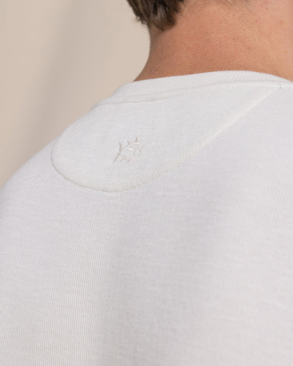 The detail view of the Southern Tide Rib Knit Henley by Southern Tide - Sand White