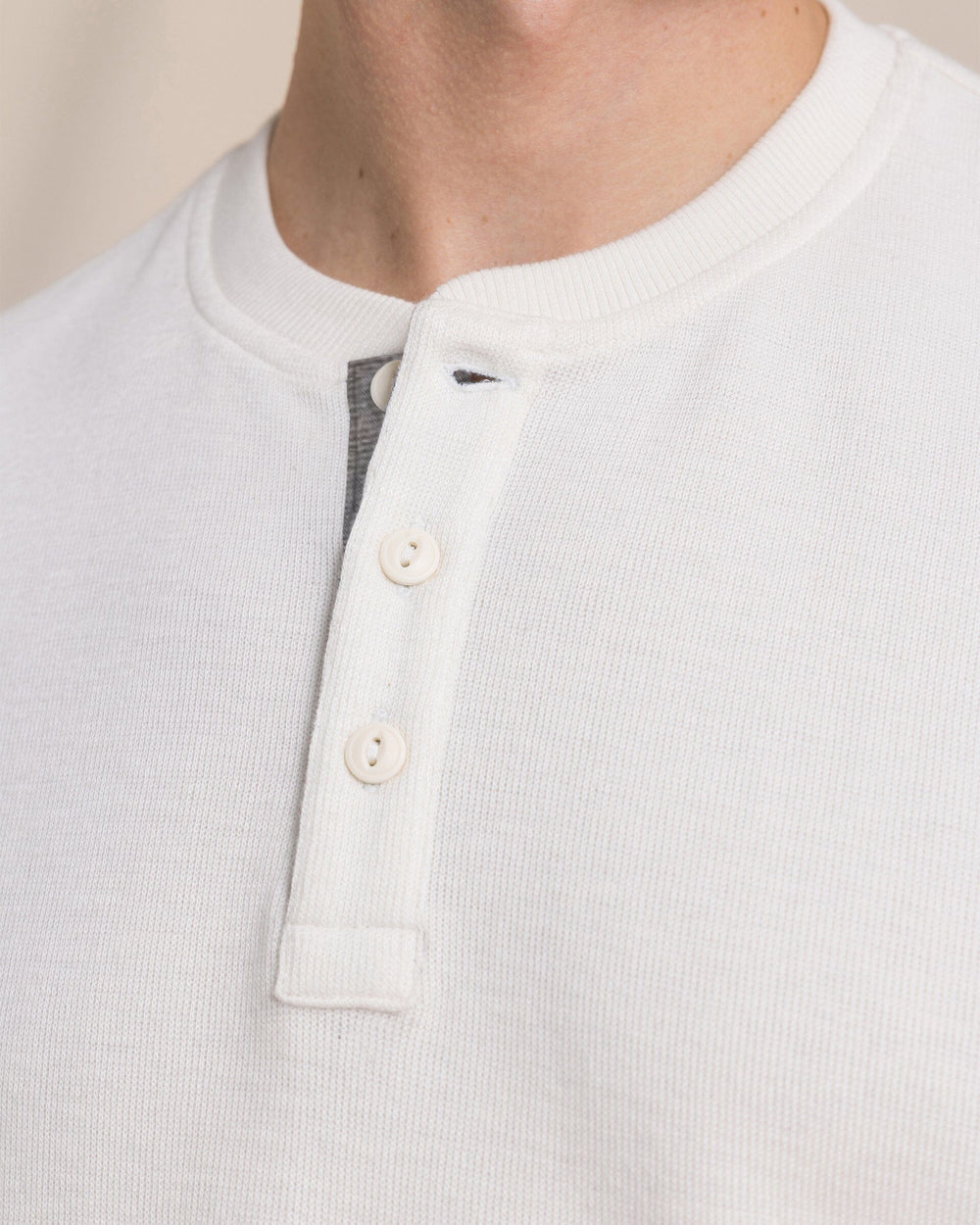 The detail view of the Southern Tide Rib Knit Henley by Southern Tide - Sand White