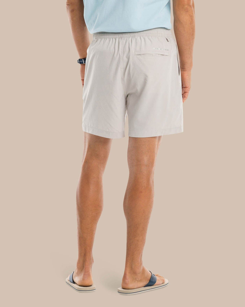 The model back view of the Men's Rip Channel 6 Inch Performance Short by Southern Tide - Marble Grey