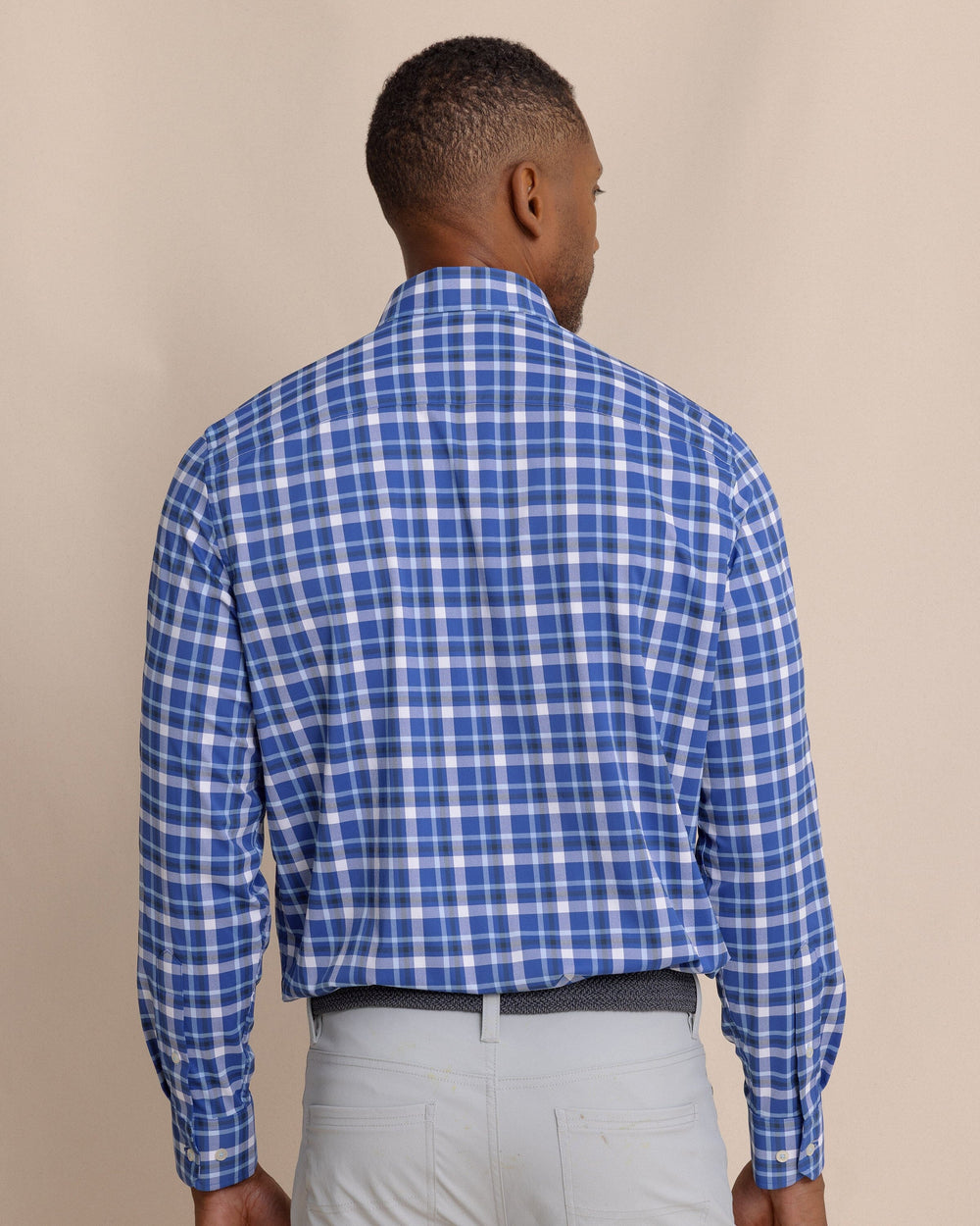 The back view of the Southern Tide River Ridge Plaid brrr°® Intercoastal Long Sleeve Sport Shirt by Southern Tide - Surf Blue