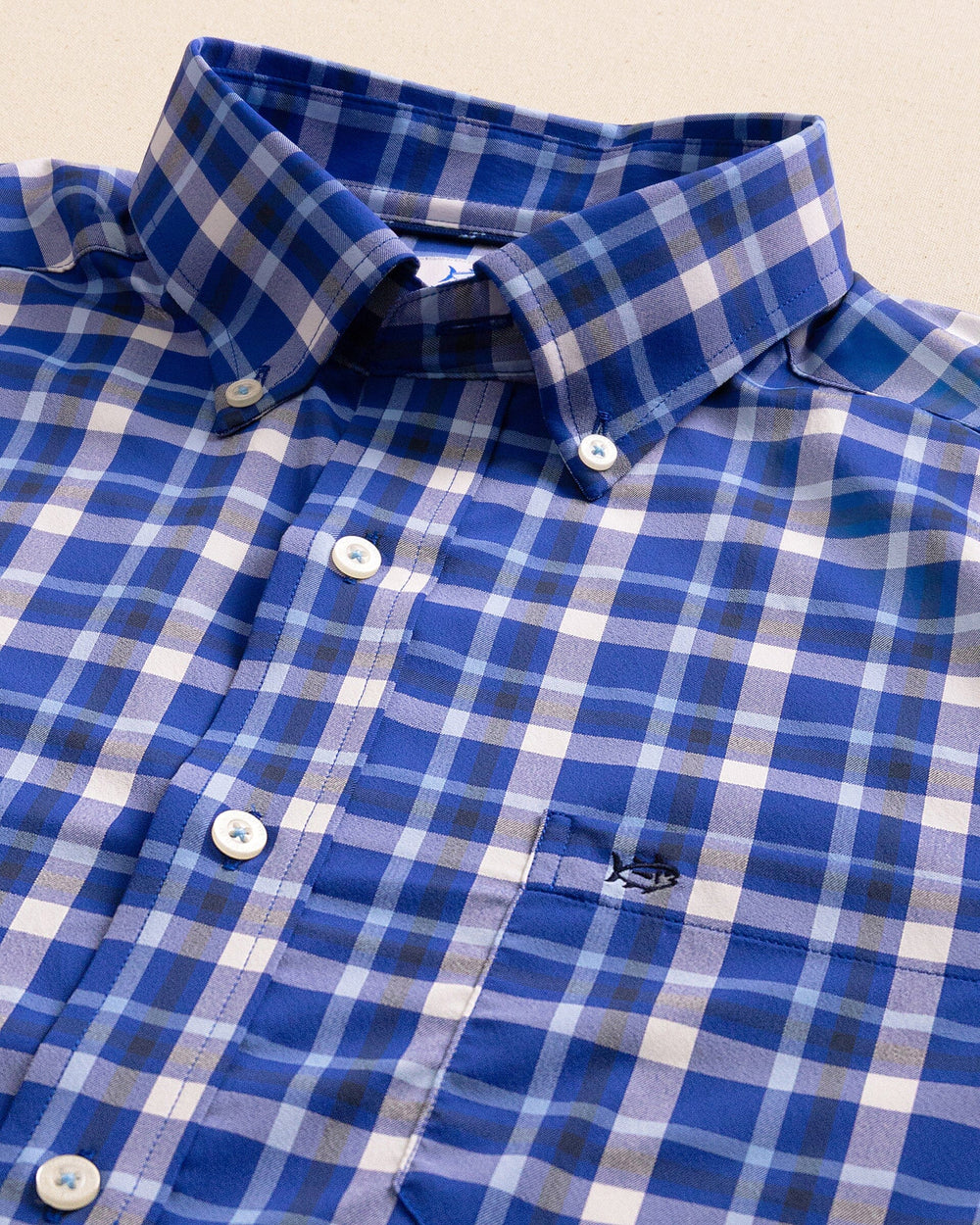 The detail view of the Southern Tide River Ridge Plaid brrr°® Intercoastal Long Sleeve Sport Shirt by Southern Tide - Surf Blue