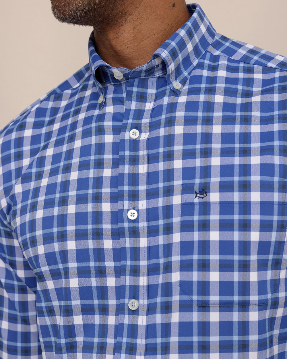 The detail view of the Southern Tide River Ridge Plaid brrr°® Intercoastal Long Sleeve Sport Shirt by Southern Tide - Surf Blue