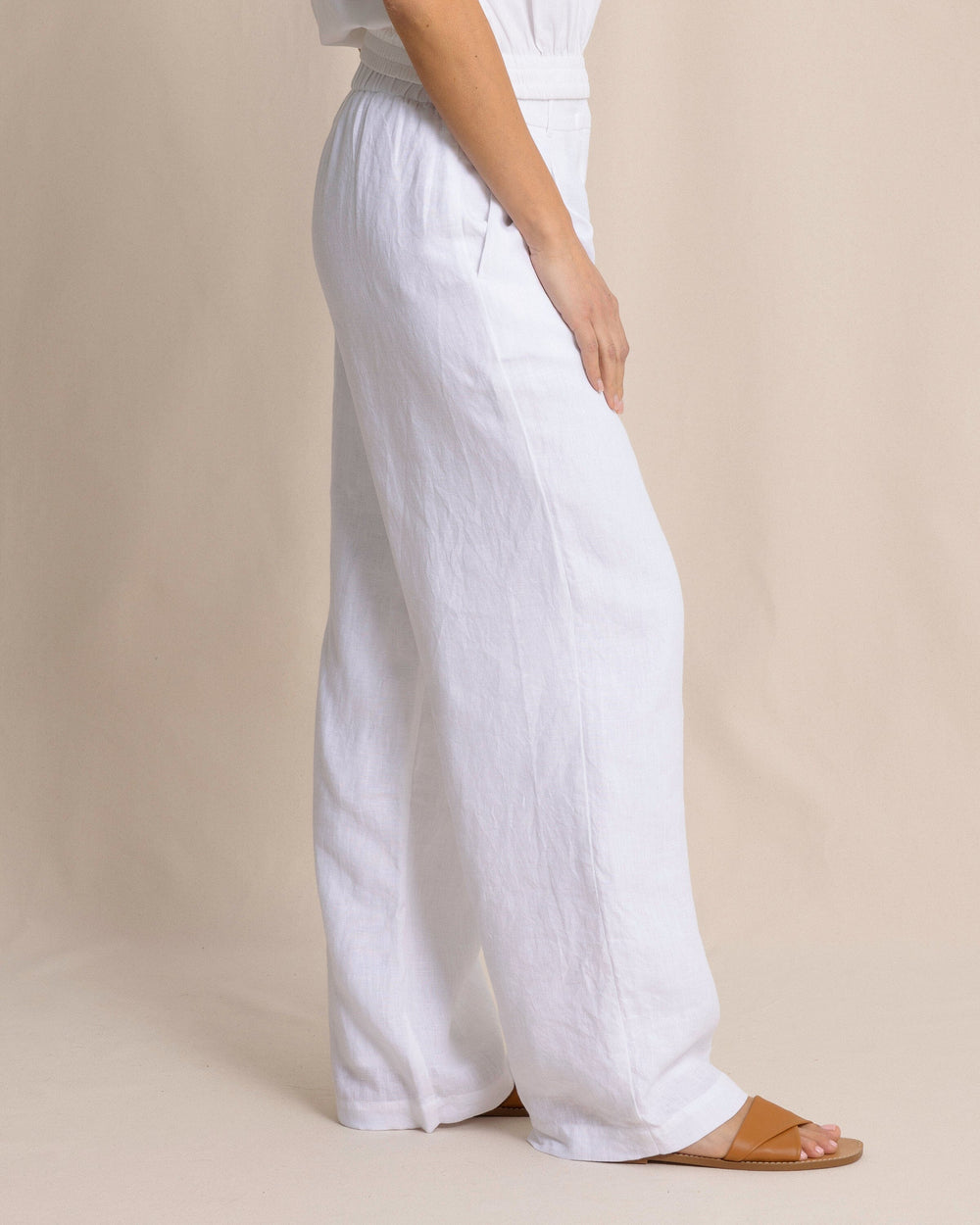 The side view of the Southern Tide Rosalee Linen Pants by Southern Tide - Classic White
