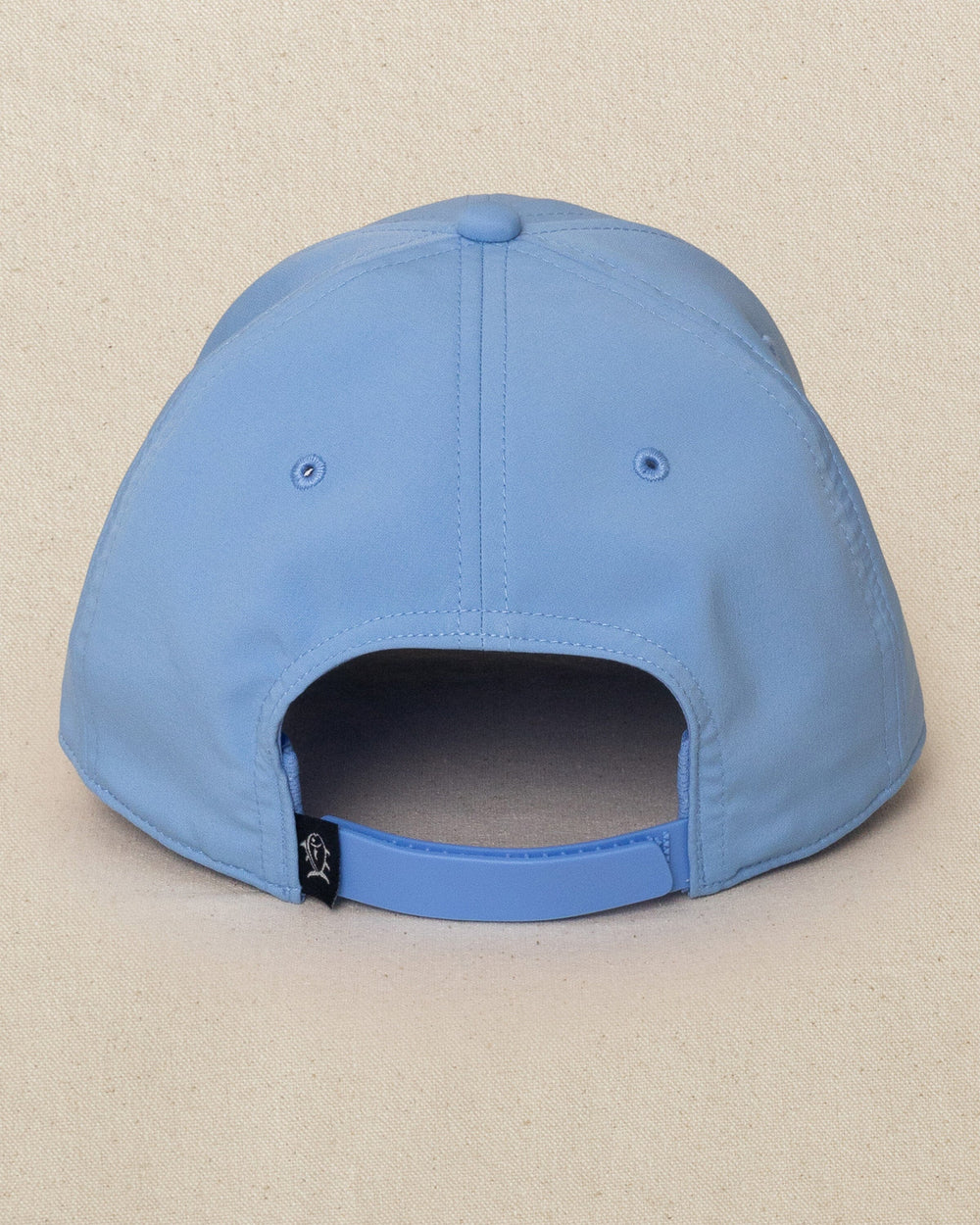 The back view of the Southern Tide Rubber Skipjack Patch Performance Hat by Southern Tide - Blue