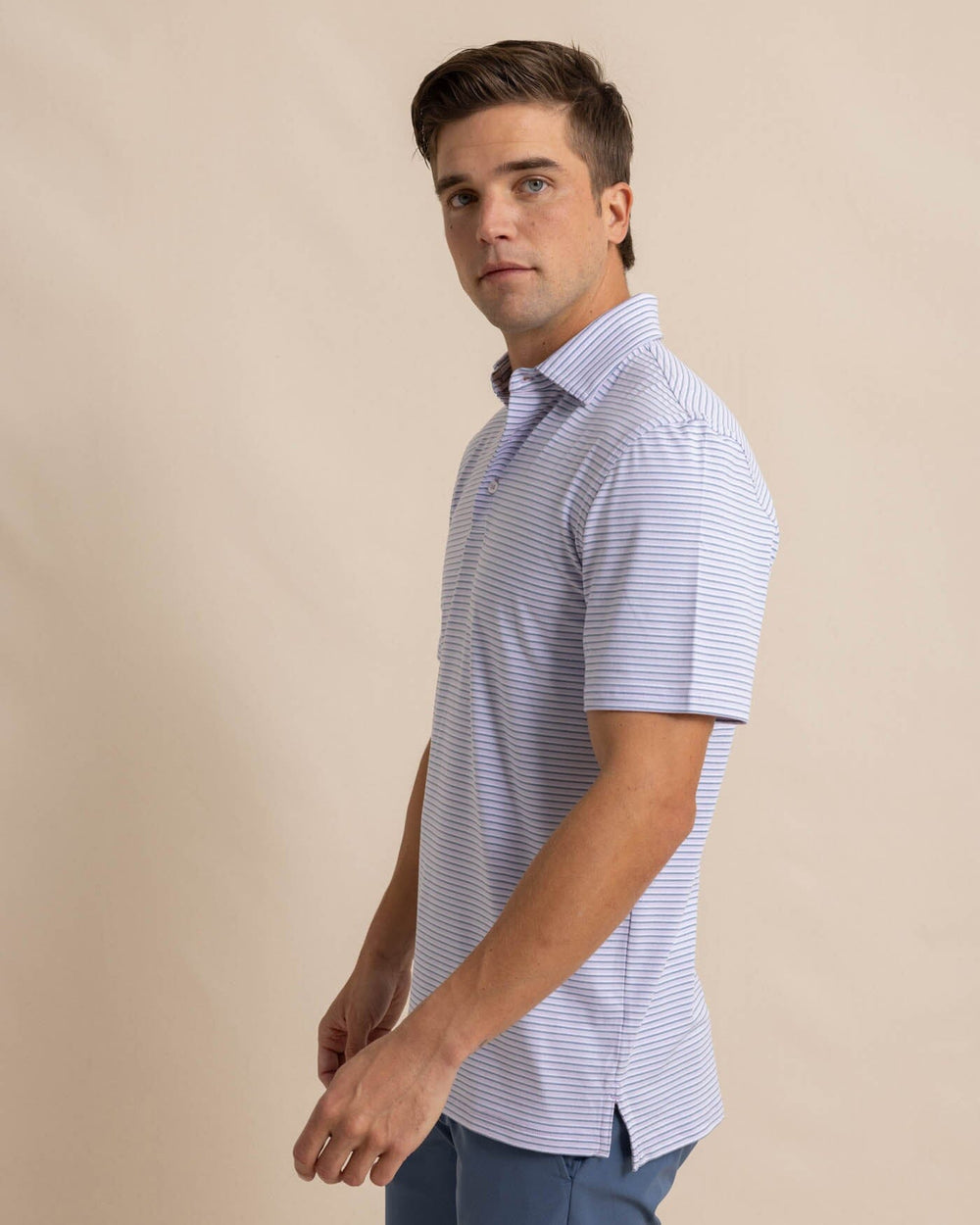 The front view of the Southern Tide Ryder Heather Halls Performance Polo by Southern Tide - Heather Orchid Petal