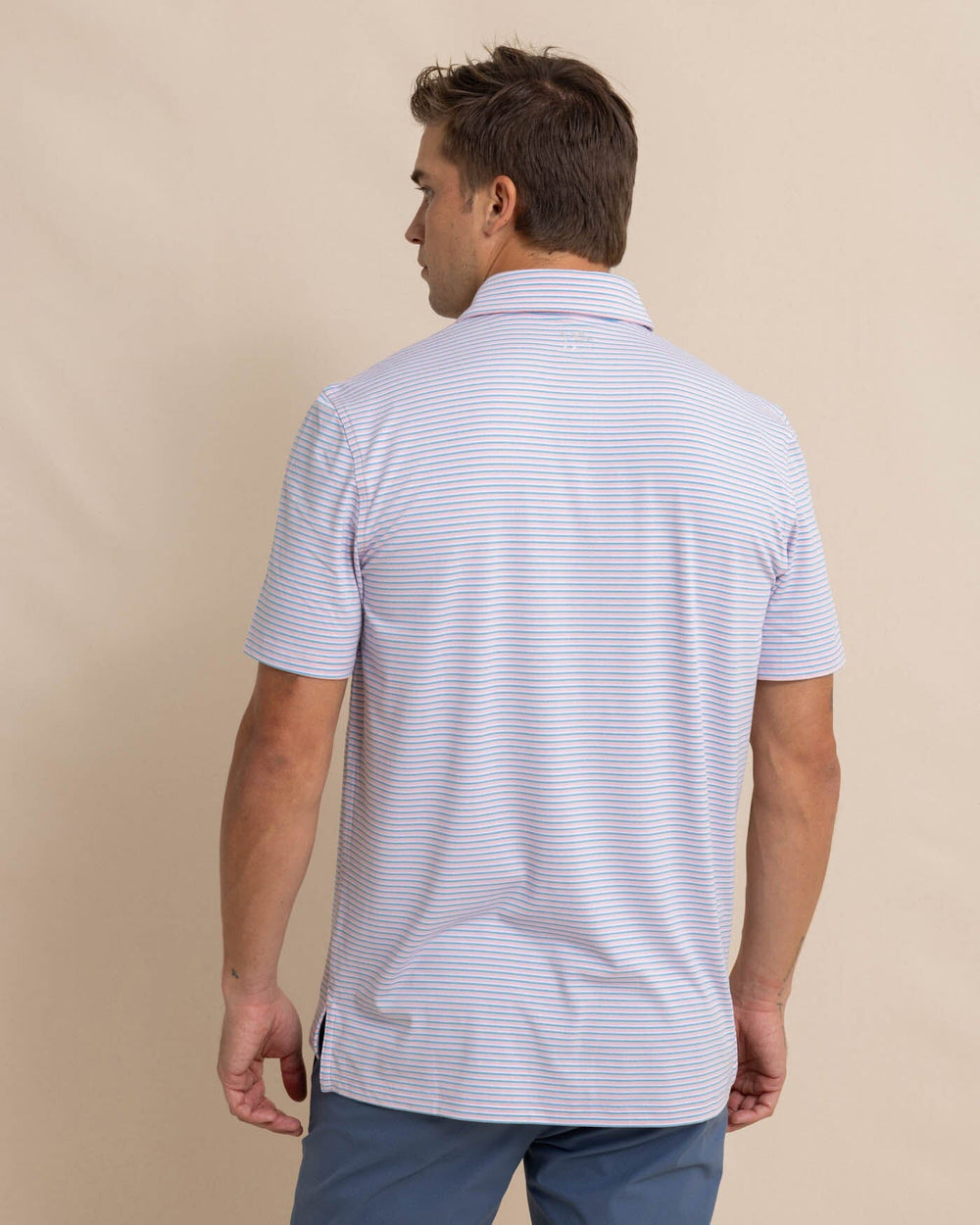 The back view of the Southern Tide Ryder Heather Halls Performance Polo by Southern Tide - Heather Pale Rosette Pink