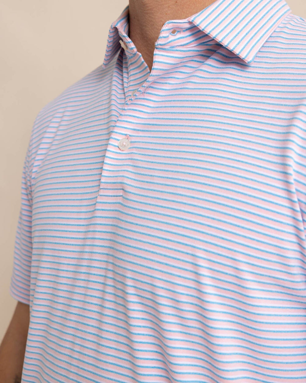 The detail view of the Southern Tide Ryder Heather Halls Performance Polo by Southern Tide - Heather Pale Rosette Pink
