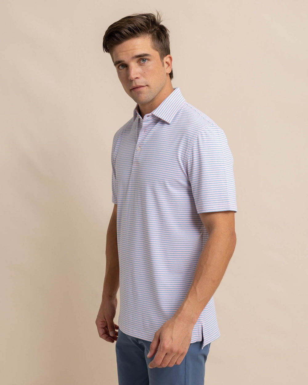 The front view of the Southern Tide Ryder Heather Halls Performance Polo by Southern Tide - Heather Pale Rosette Pink