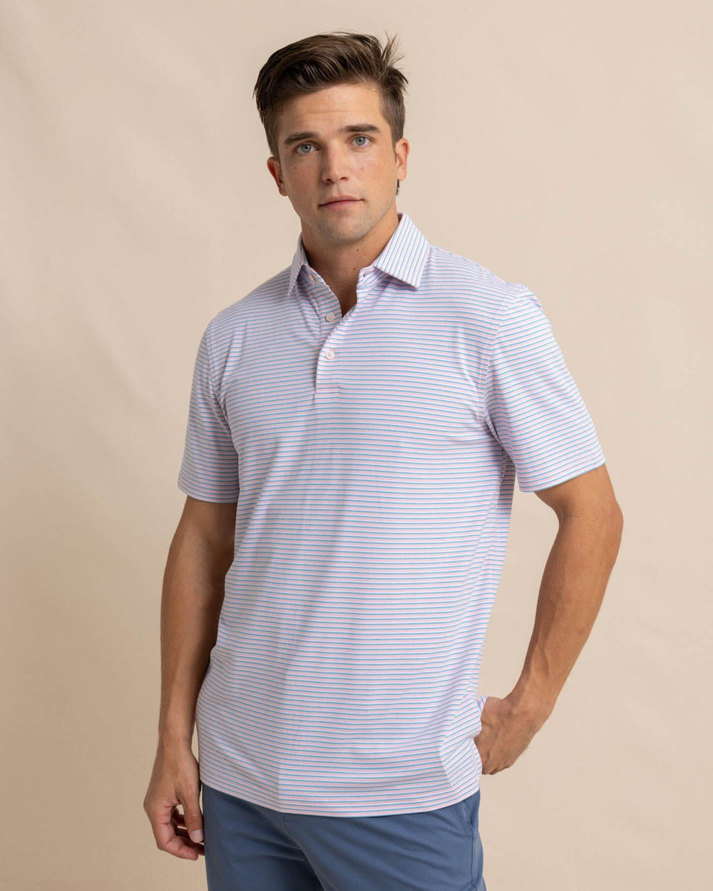 The front view of the Southern Tide Ryder Heather Halls Performance Polo by Southern Tide - Heather Pale Rosette Pink