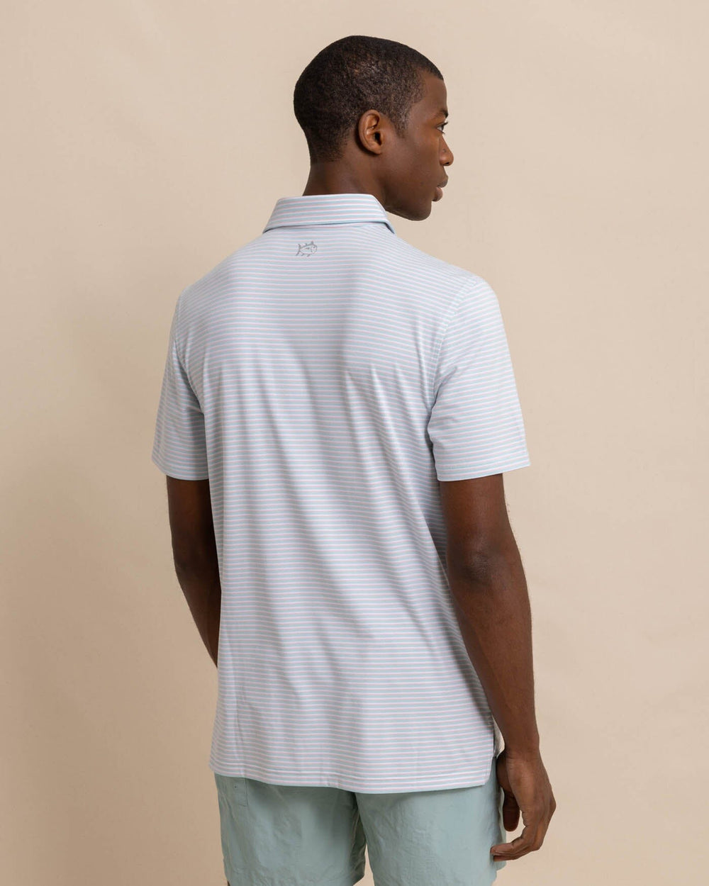 The back view of the Southern Tide Ryder Heather Halls Performance Polo by Southern Tide - Heather Wake Blue
