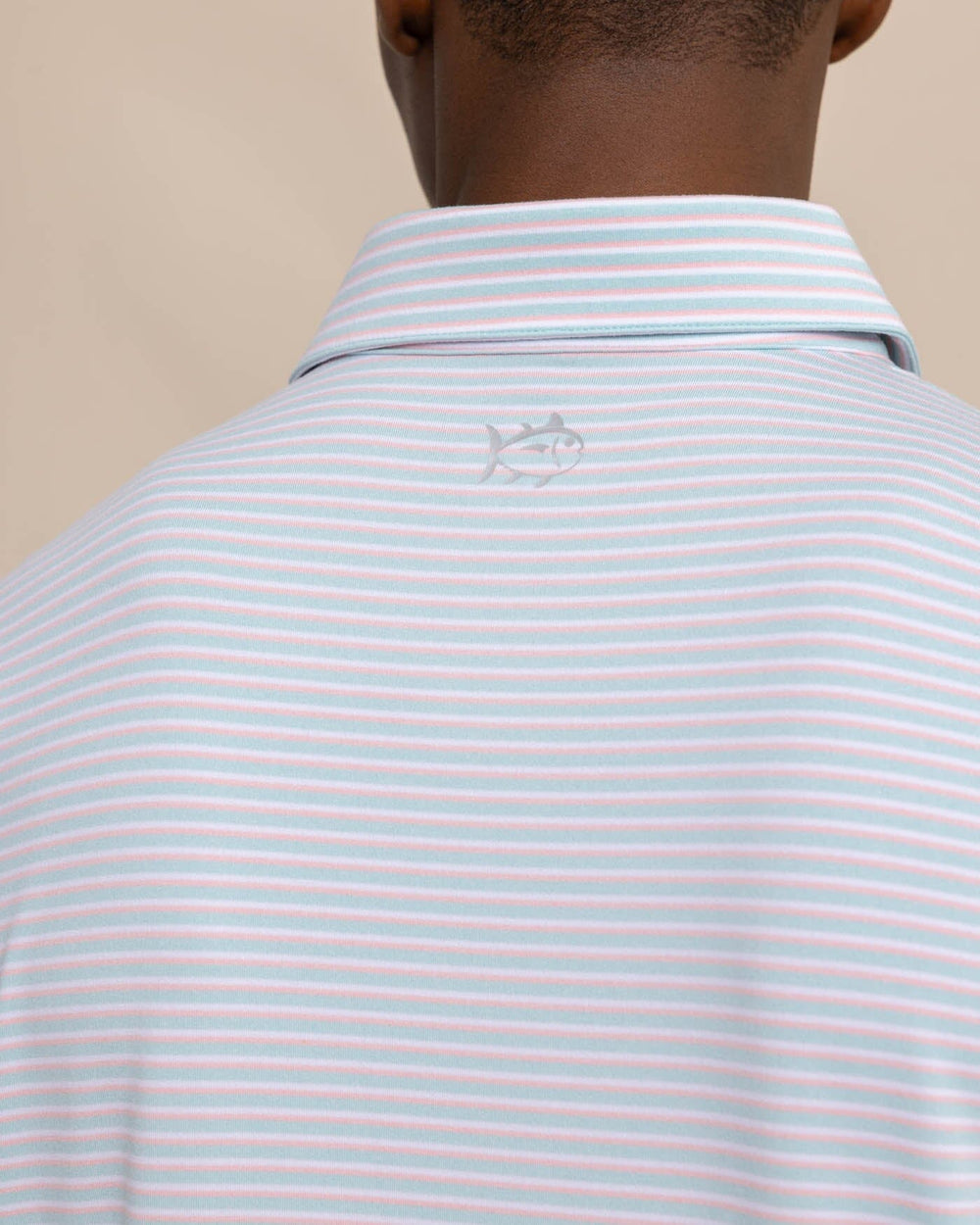 The detail view of the Southern Tide Ryder Heather Halls Performance Polo by Southern Tide - Heather Wake Blue