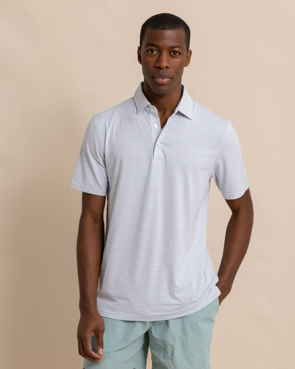 The front view of the Southern Tide Ryder Heather Halls Performance Polo by Southern Tide - Heather Wake Blue