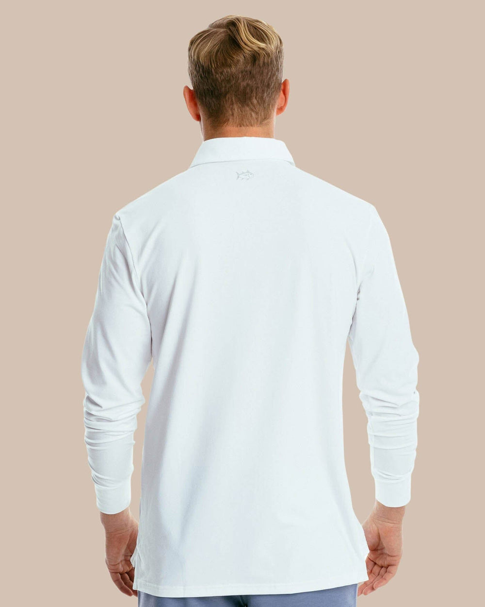 The back of the Men's Ryder Long Sleeve Performance Polo Shirt by Southern Tide - Classic White