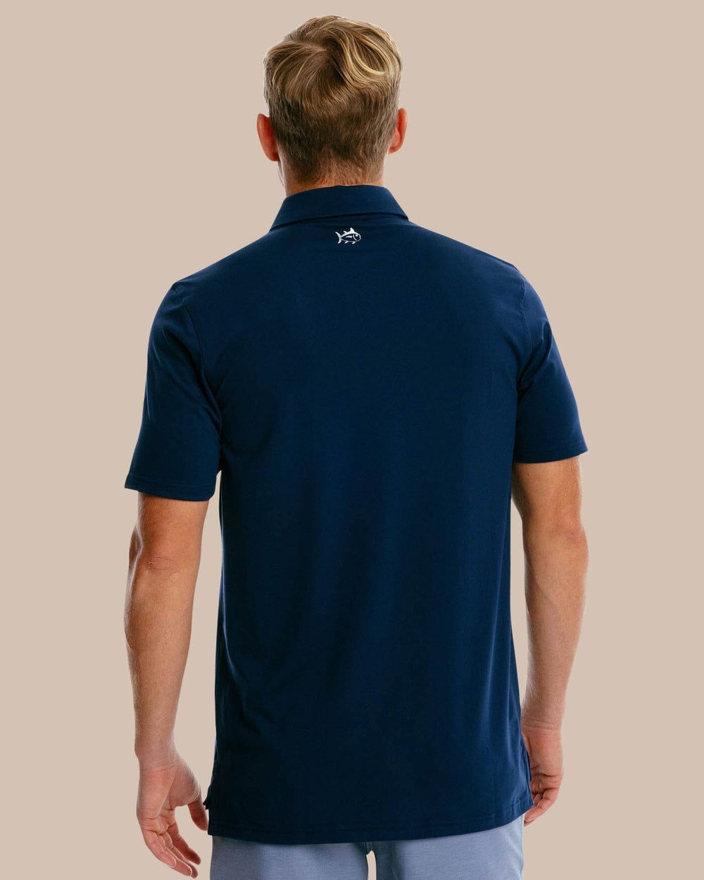 The back of the Men's Ryder Performance Polo Shirt by Southern Tide - True Navy
