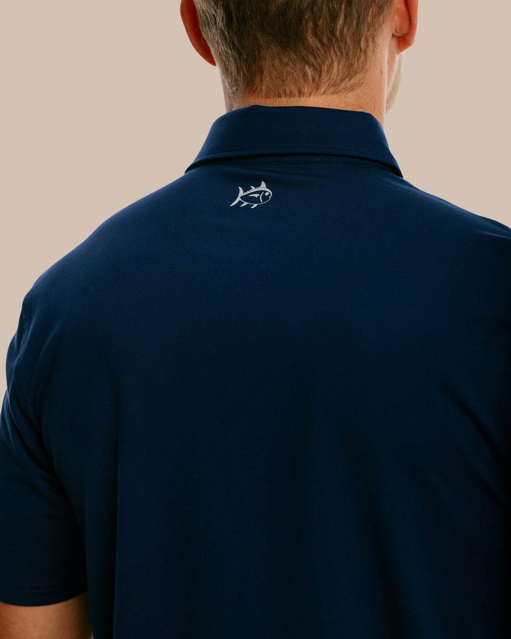 The yoke of the Men's Ryder Performance Polo Shirt by Southern Tide - True Navy