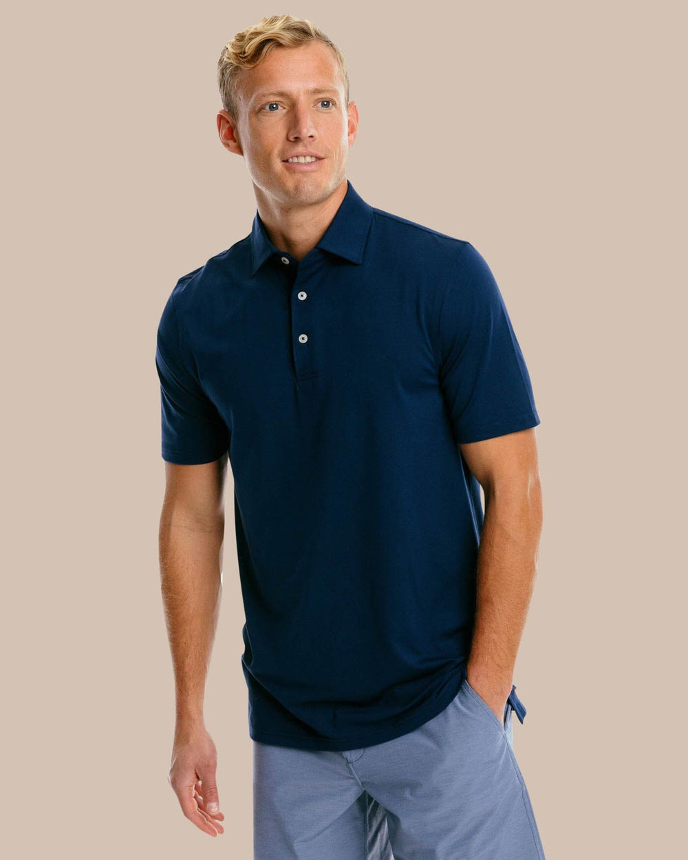 The front of the Men's Ryder Performance Polo Shirt by Southern Tide - True Navy