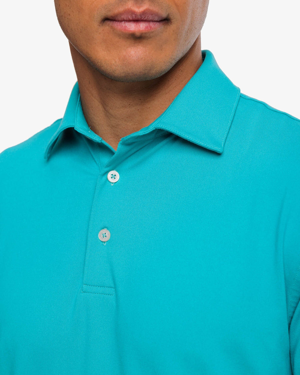 The detail view of the Southern Tide Ryder Lilly Polo Shirt by Southern Tide - Water Lilly Green
