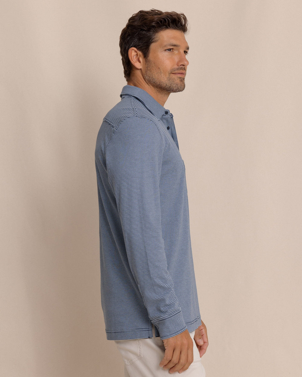 The side view of the Southern Tide Sandy Cay Long Sleeve Knit Polo by Southern Tide - Dress Blue