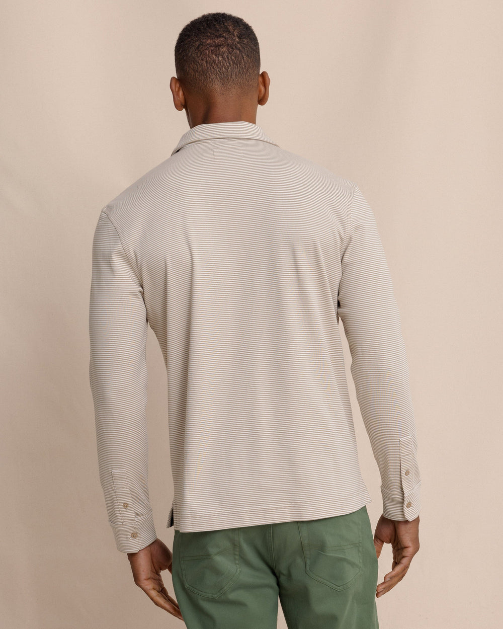 The back view of the Southern Tide Sandy Cay Long Sleeve Knit Polo by Southern Tide - Sandstone Khaki