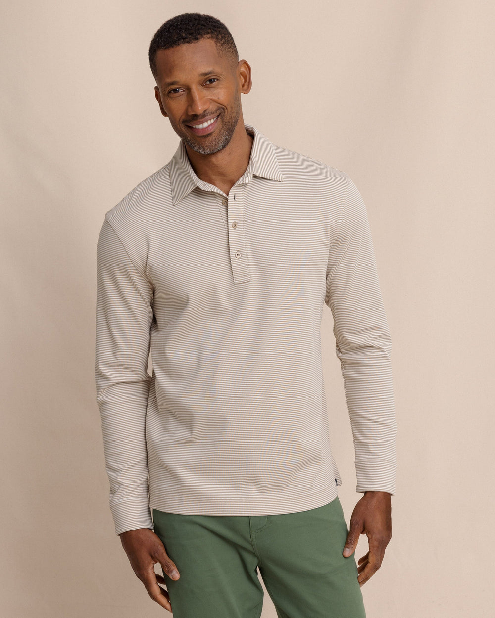 The front view of the Southern Tide Sandy Cay Long Sleeve Knit Polo by Southern Tide - Sandstone Khaki