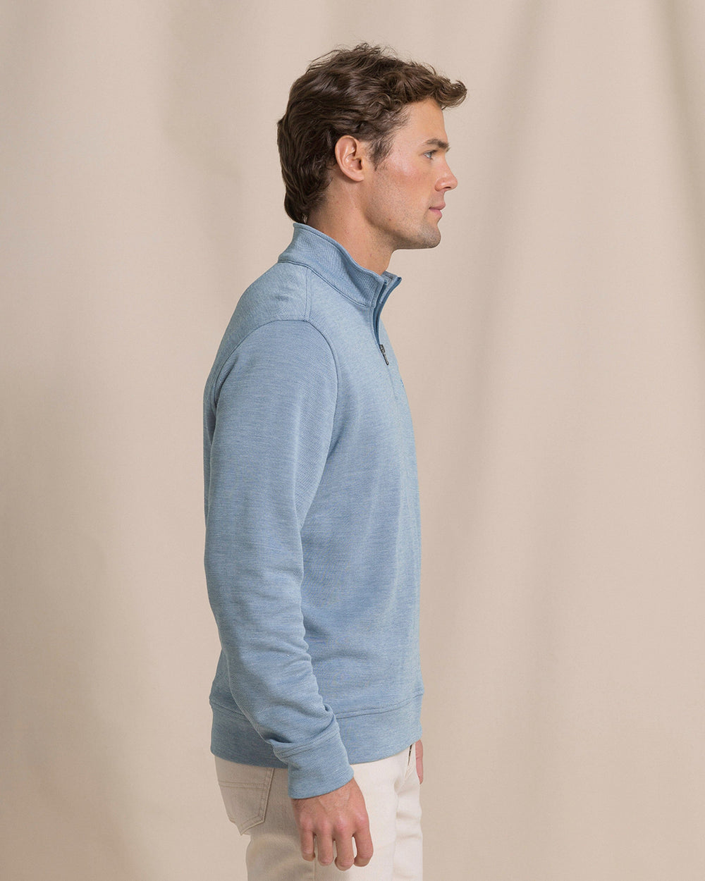The side view of the Southern Tide Sandy Cove Pique Quarter Zip by Southern Tide - Nautical Blue