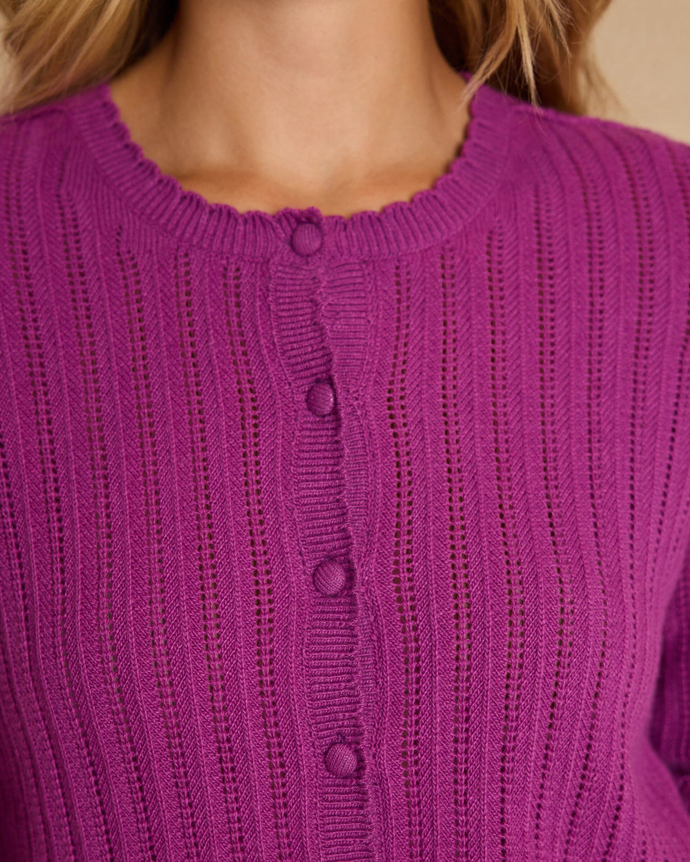 The detail view of the Southern Tide Scallop Pointelle Cardigan Sweater by Southern Tide - Deep Orchid
