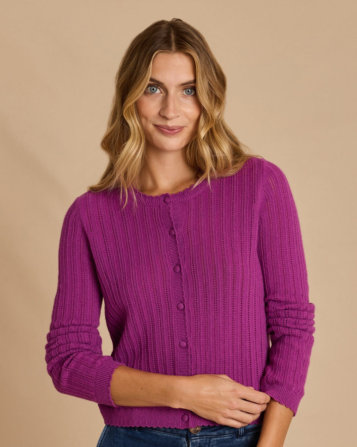 The front view of the Southern Tide Scallop Pointelle Cardigan Sweater by Southern Tide - Deep Orchid