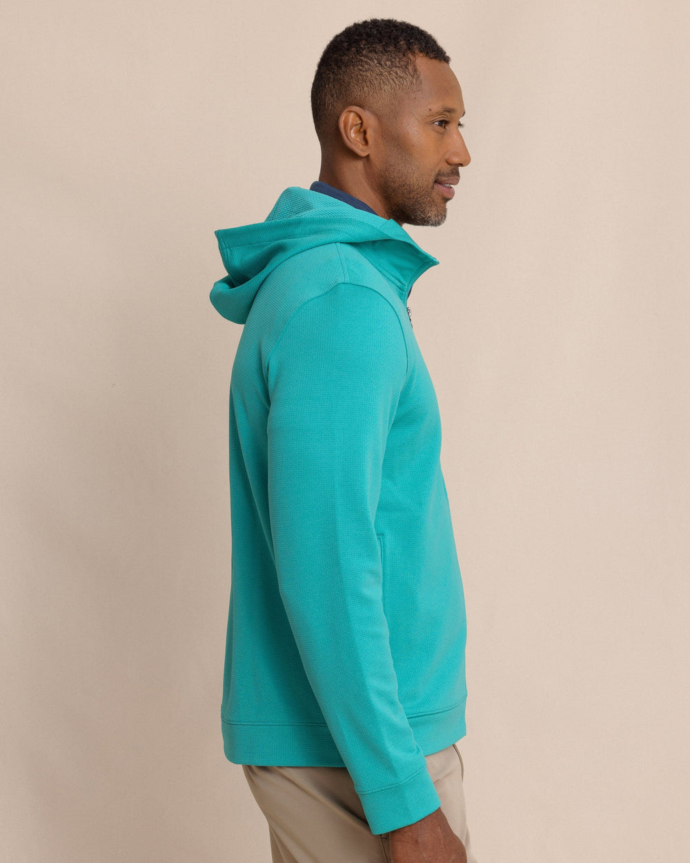 The side view of the Southern Tide Schooner Full-Zip Hoodie by Southern Tide - Spruce Shade