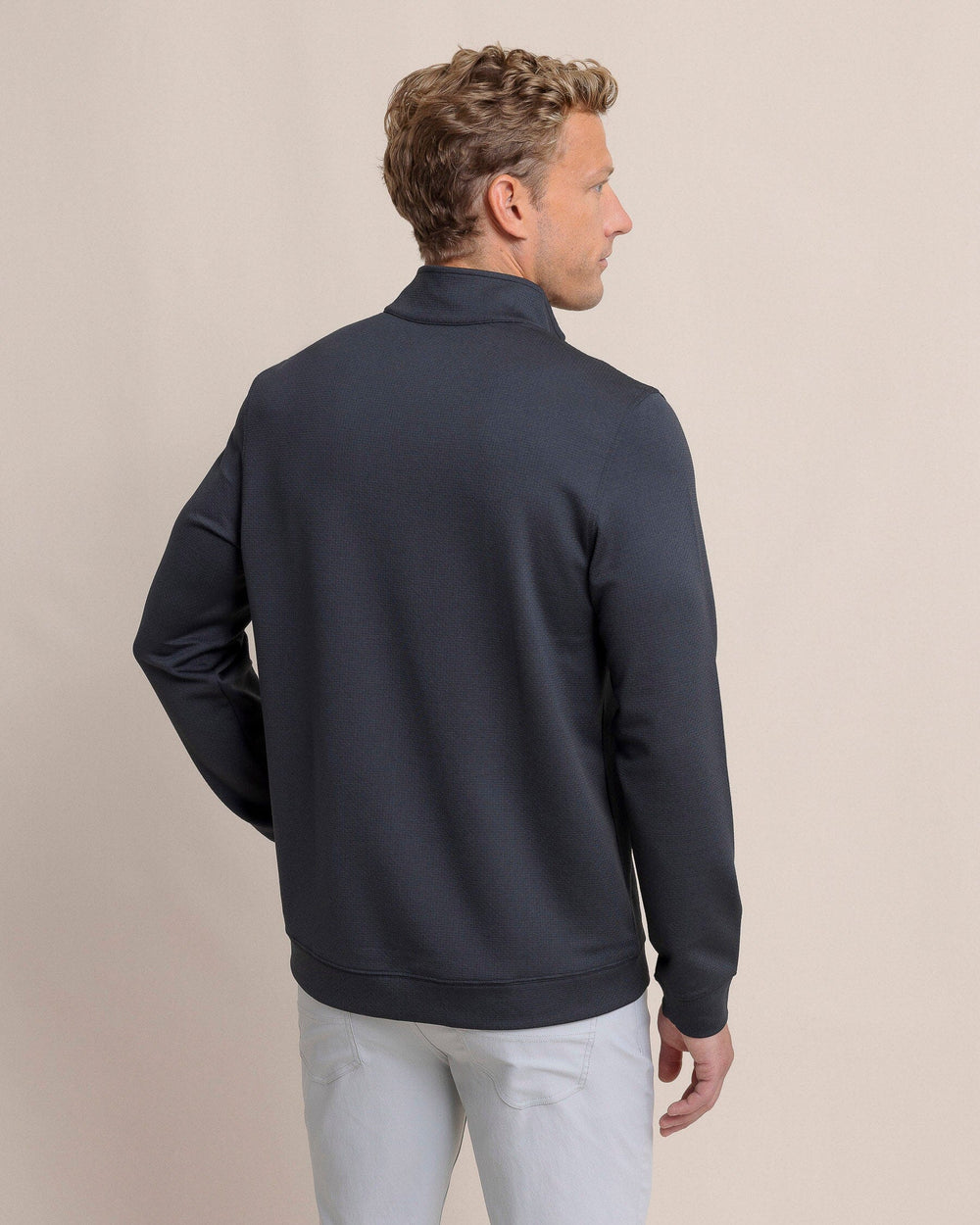 The back view of the Southern Tide Schooner Long Sleeve Quarter Zip by Southern Tide - Caviar Black