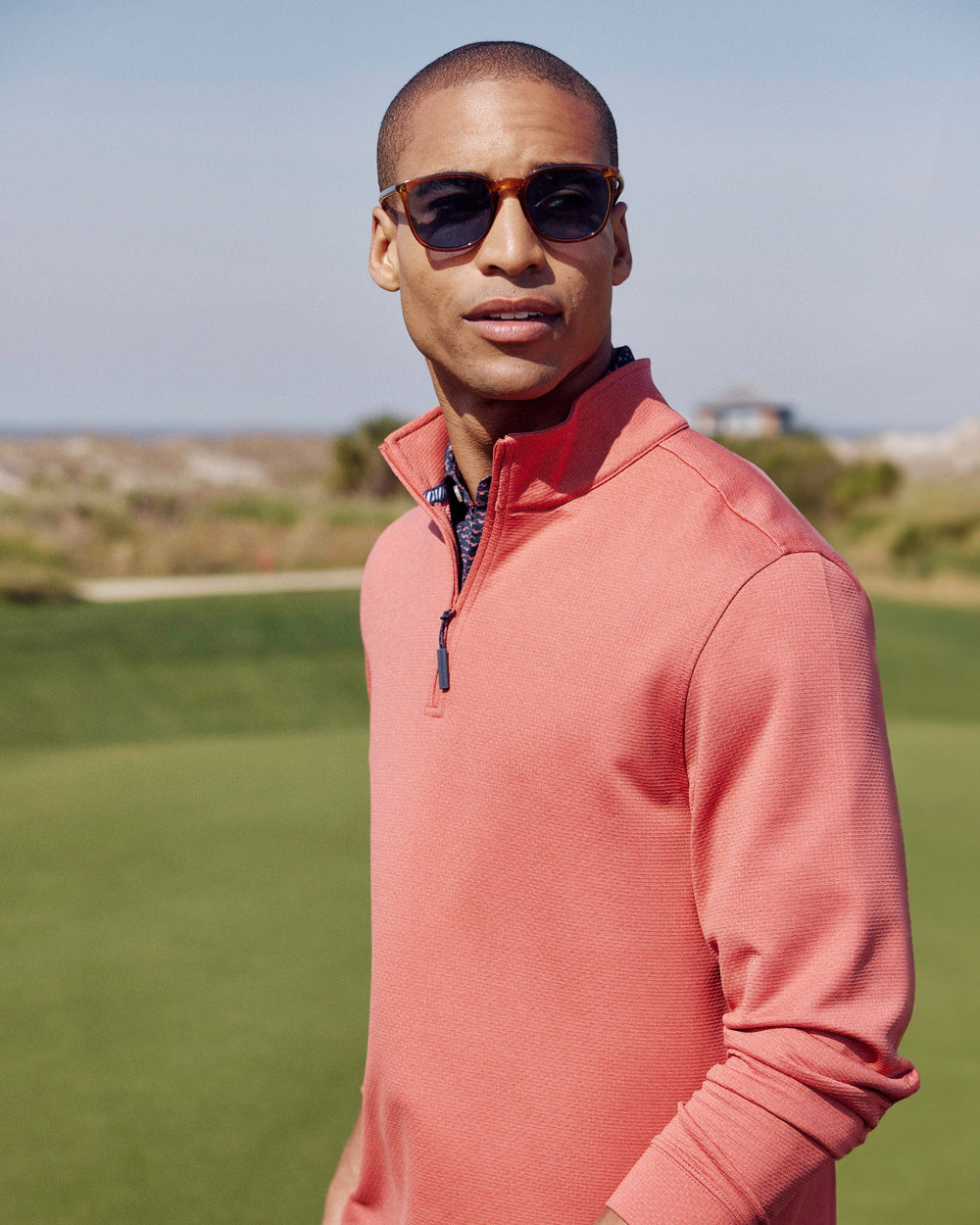 The lifestyle view of the Southern Tide Schooner Long Sleeve Quarter Zip by Southern Tide - Mineral Red