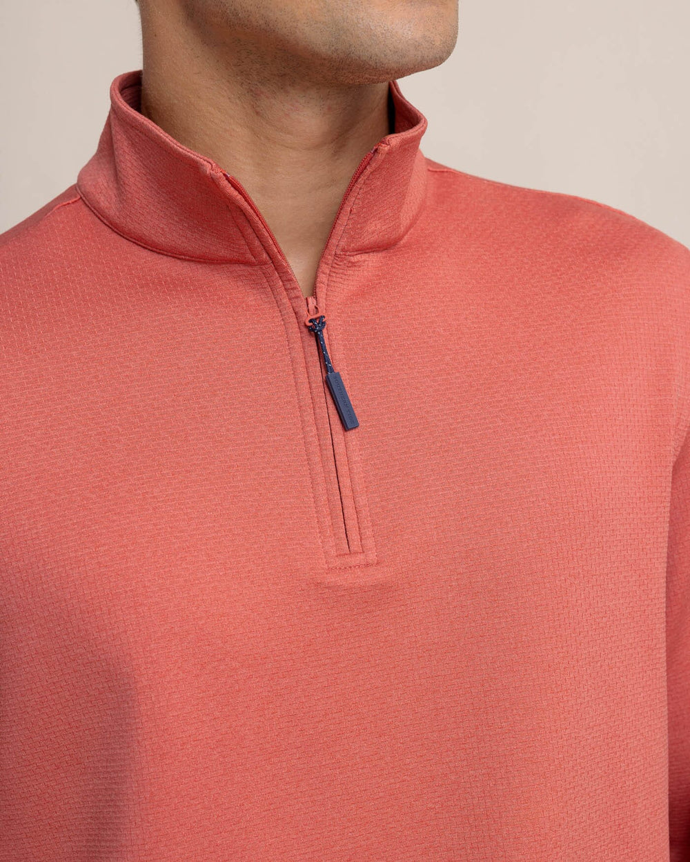 The detail view of the Southern Tide Schooner Long Sleeve Quarter Zip by Southern Tide - Mineral Red