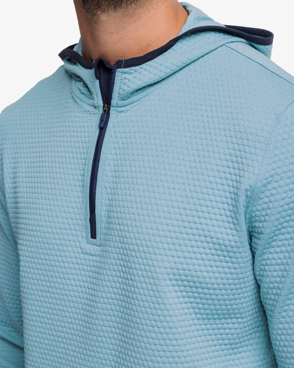 The detail view of the Southern Tide Scuttle Heather Performance Quarter Zip Hoodie by Southern Tide - Heather Ocean Teal