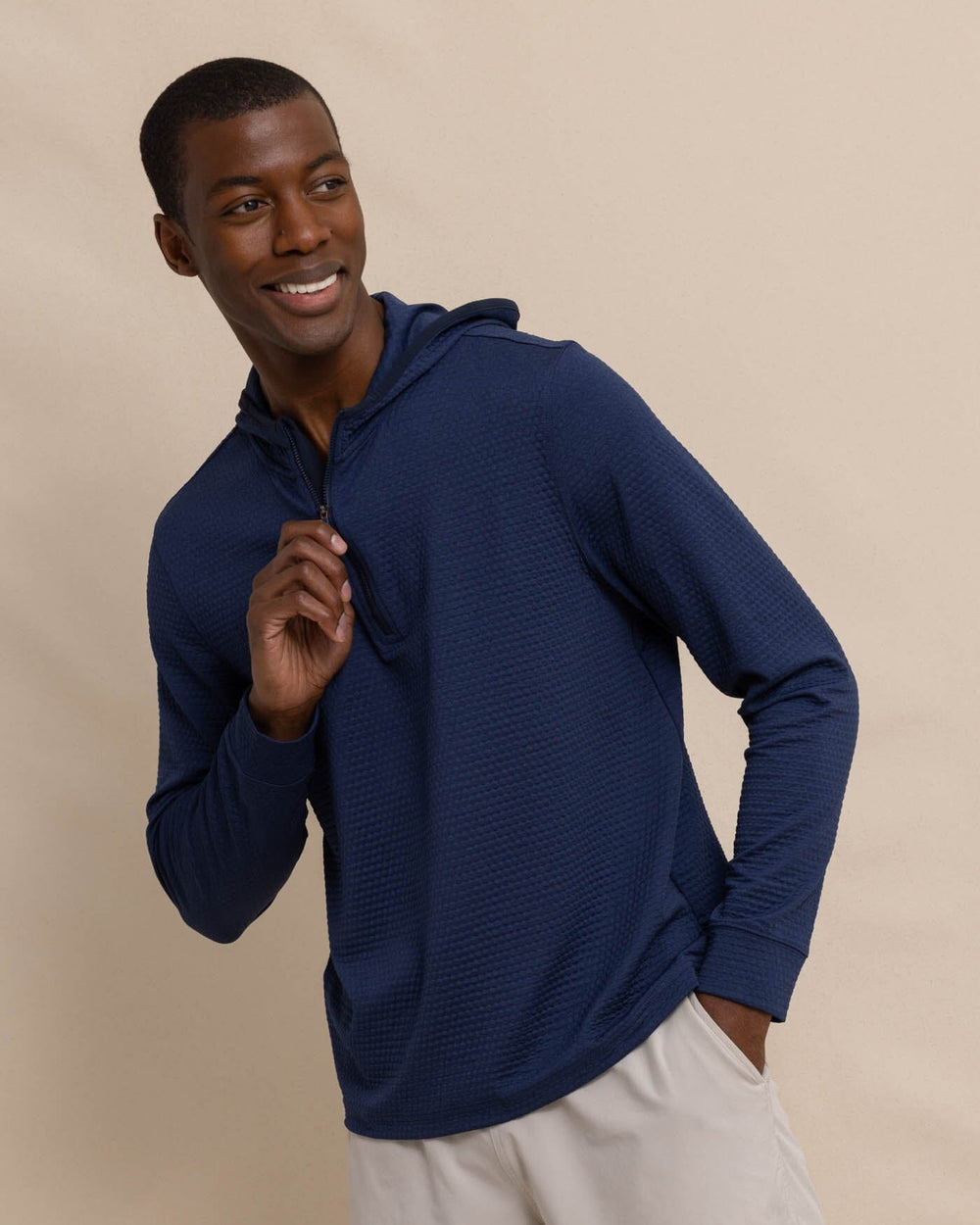 The front view of the Southern Tide Scuttle Heather Performance Quarter Zip Hoodie by Southern Tide - Heather True Navy