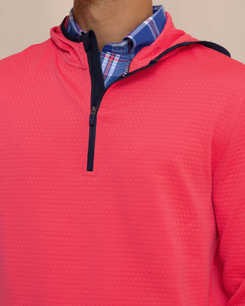 The detail view of the Southern Tide Scuttle Performance Quarter Zip Hoodie by Southern Tide - Heather Snapper