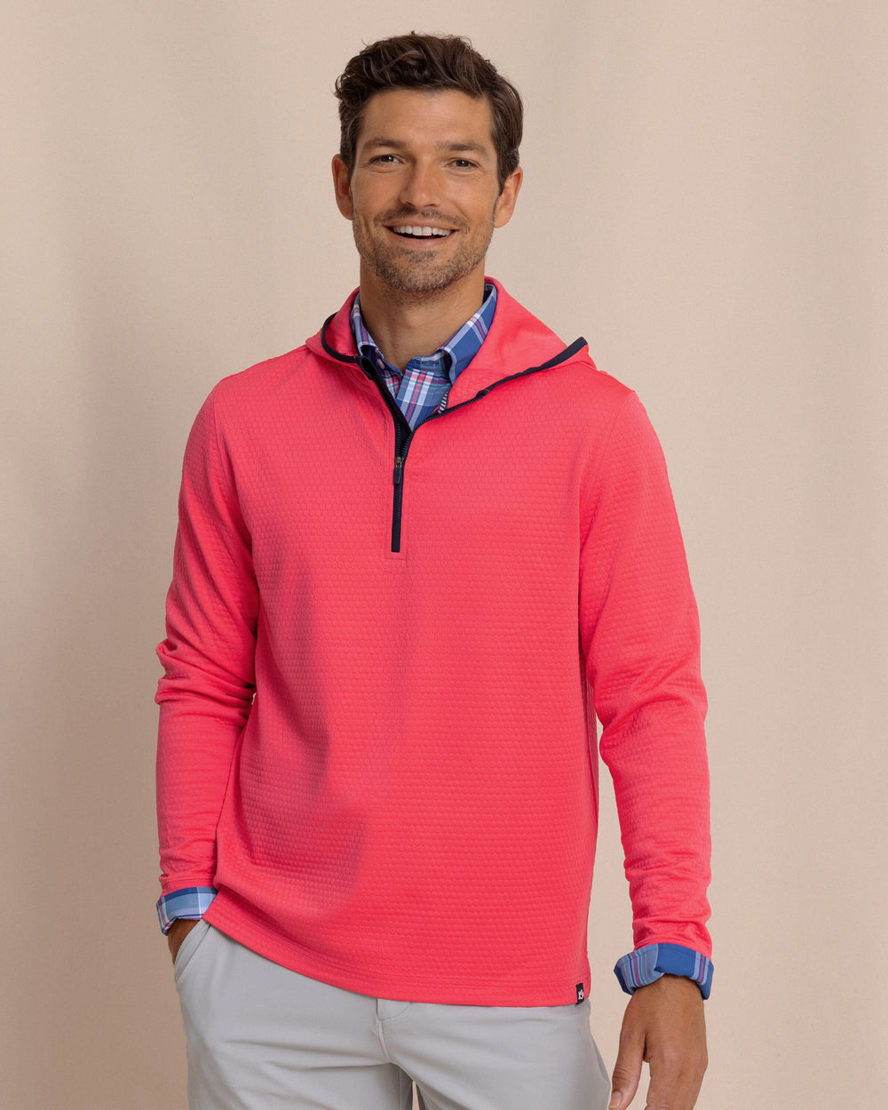 The front view of the Southern Tide Scuttle Performance Quarter Zip Hoodie by Southern Tide - Heather Snapper