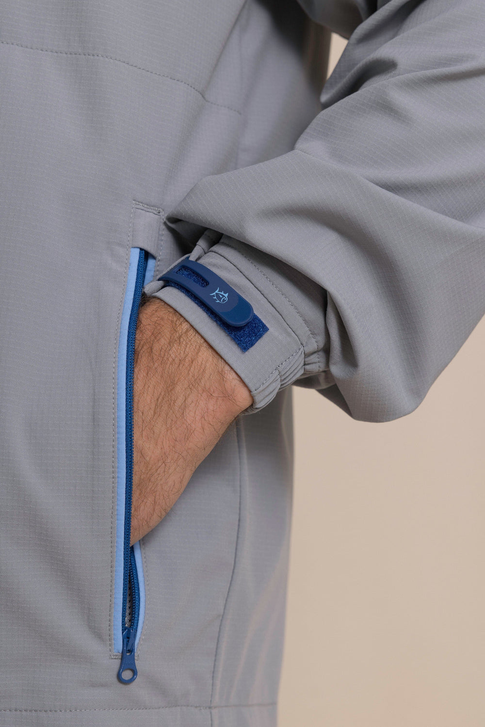 The detail view of the Southern Tide Seabreeze Performance Pullover by Southern Tide - Steel Grey