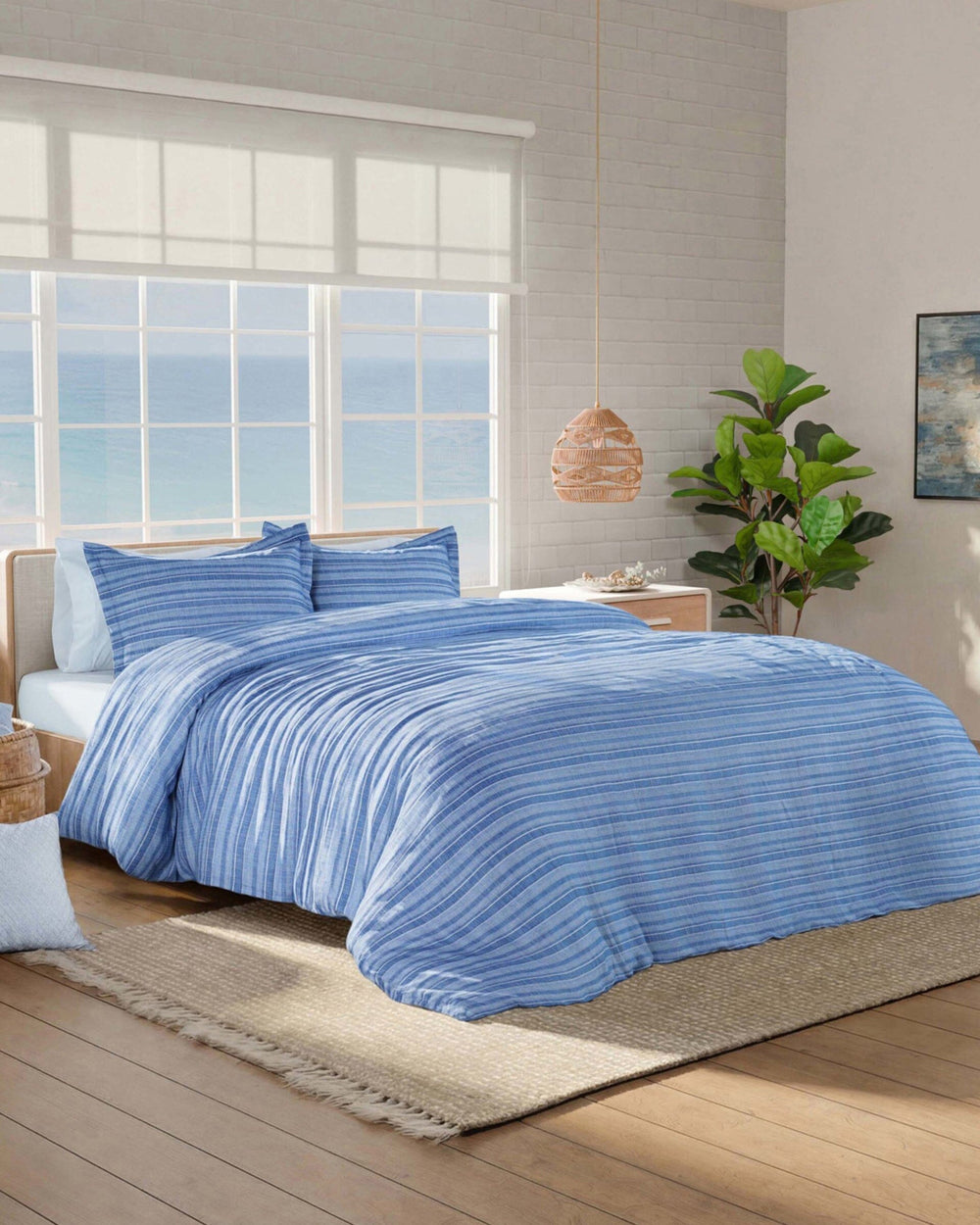 The side view of the Southern Tide Seafarer Comforter Set by Southern Tide - Blue