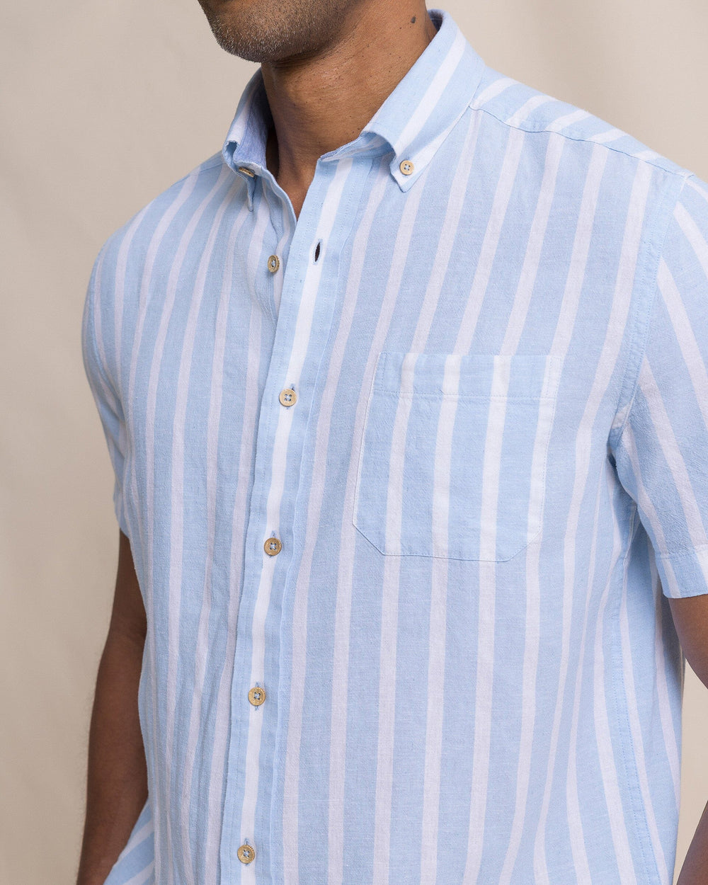 The detail view of the Southern Tide Seamark Stripe Linen Rayon Short Sleeve Sport Shirt by Southern Tide - Tide Blue