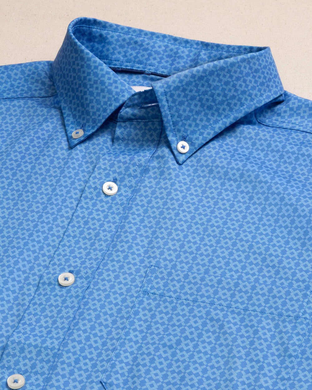 The detail view of the Southern Tide Seaside Geo Coastal Breeze® Short Sleeve Sport Shirt by Southern Tide - Blue Stream