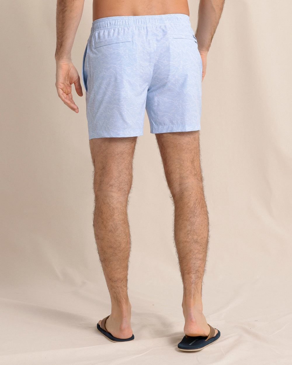 The back view of the Southern Tide Shark Bait Swim Trunk by Southern Tide - Cerulean