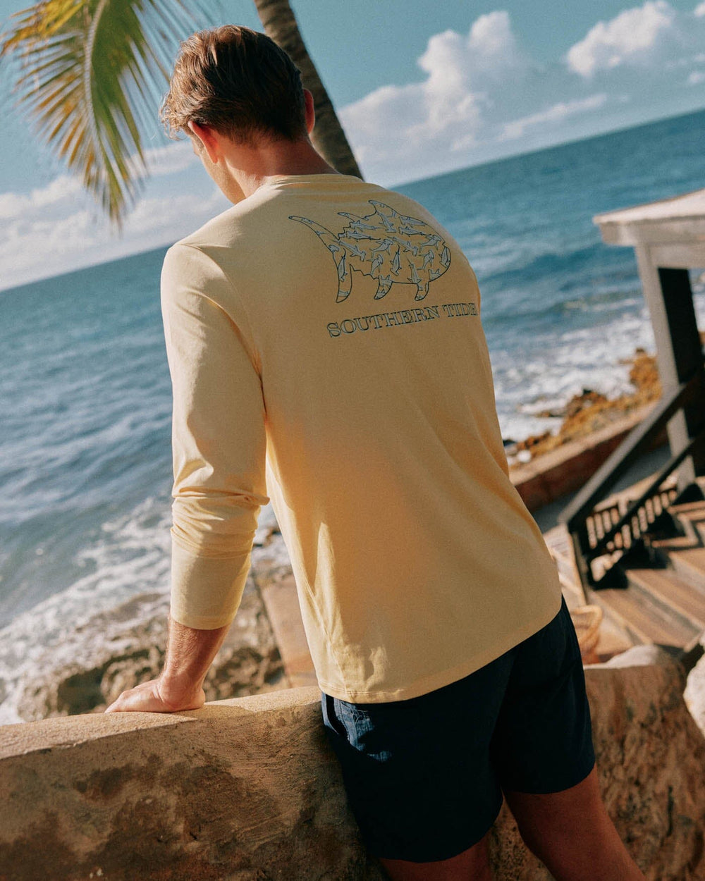 The front view of the Southern Tide Sharks and Skipjacks Performance Long Sleeve T-Shirt by Southern Tide - Golden Haze Yellow