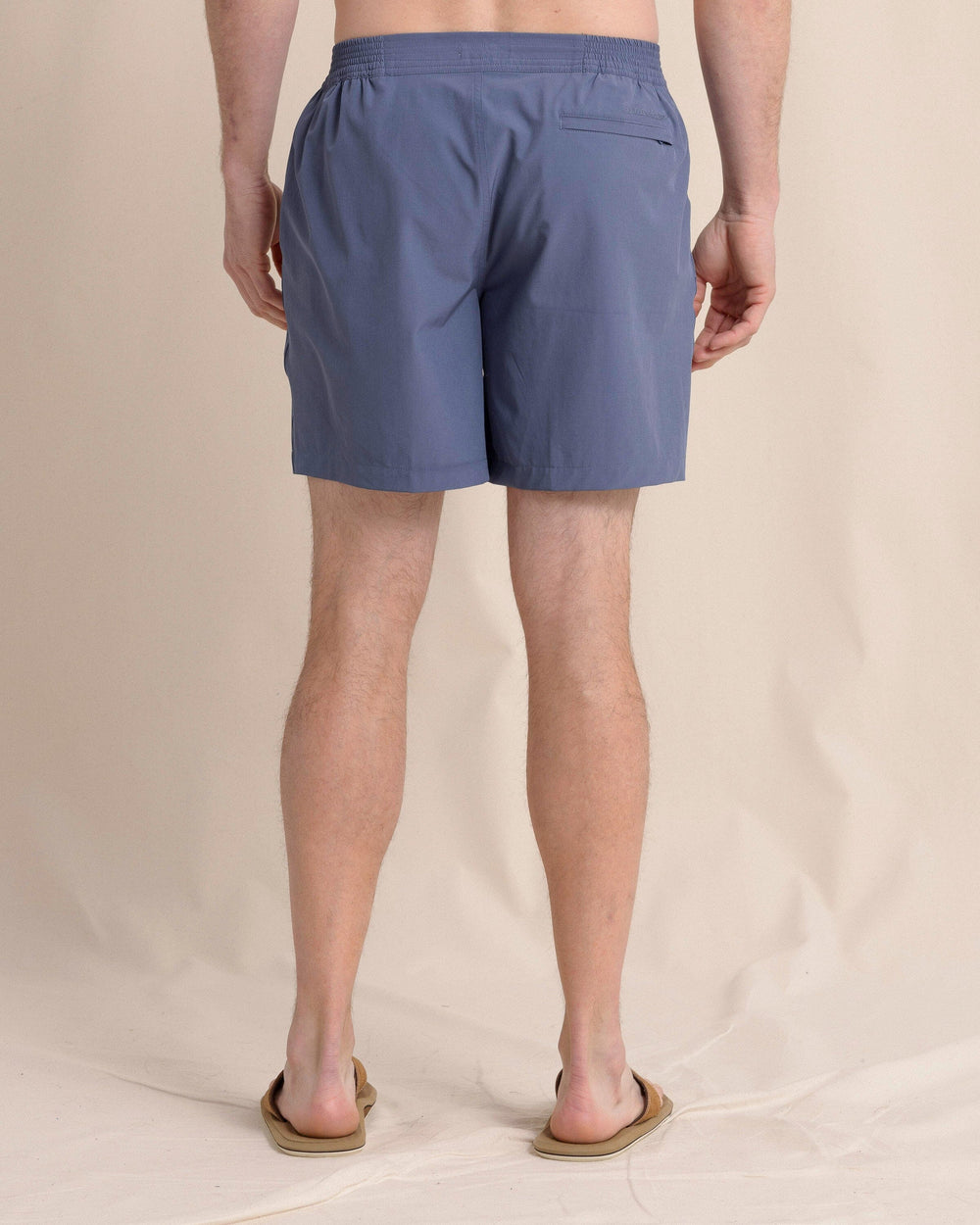 The back view of the Southern Tide Shelter Cove Swim Trunk by Southern Tide - Light Indigo