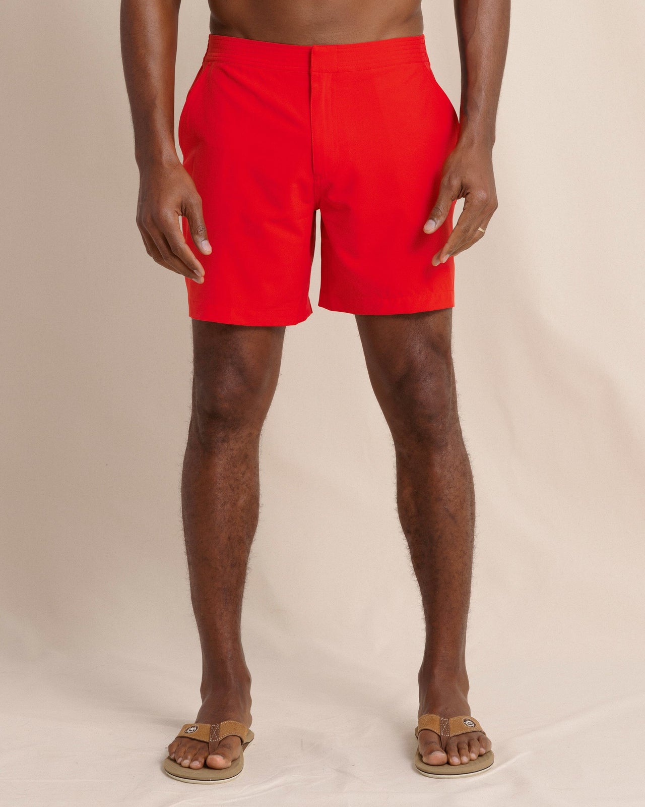 The front view of the Southern Tide Shelter Cove Swim Trunk by Southern Tide - Poppy Red