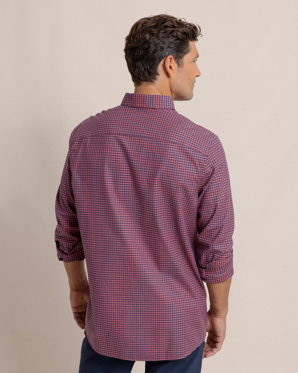 The back view of the Southern Tide Shemwood Plaid Skipjack Long Sleeve Sport Shirt by Southern Tide - Baroque Rose