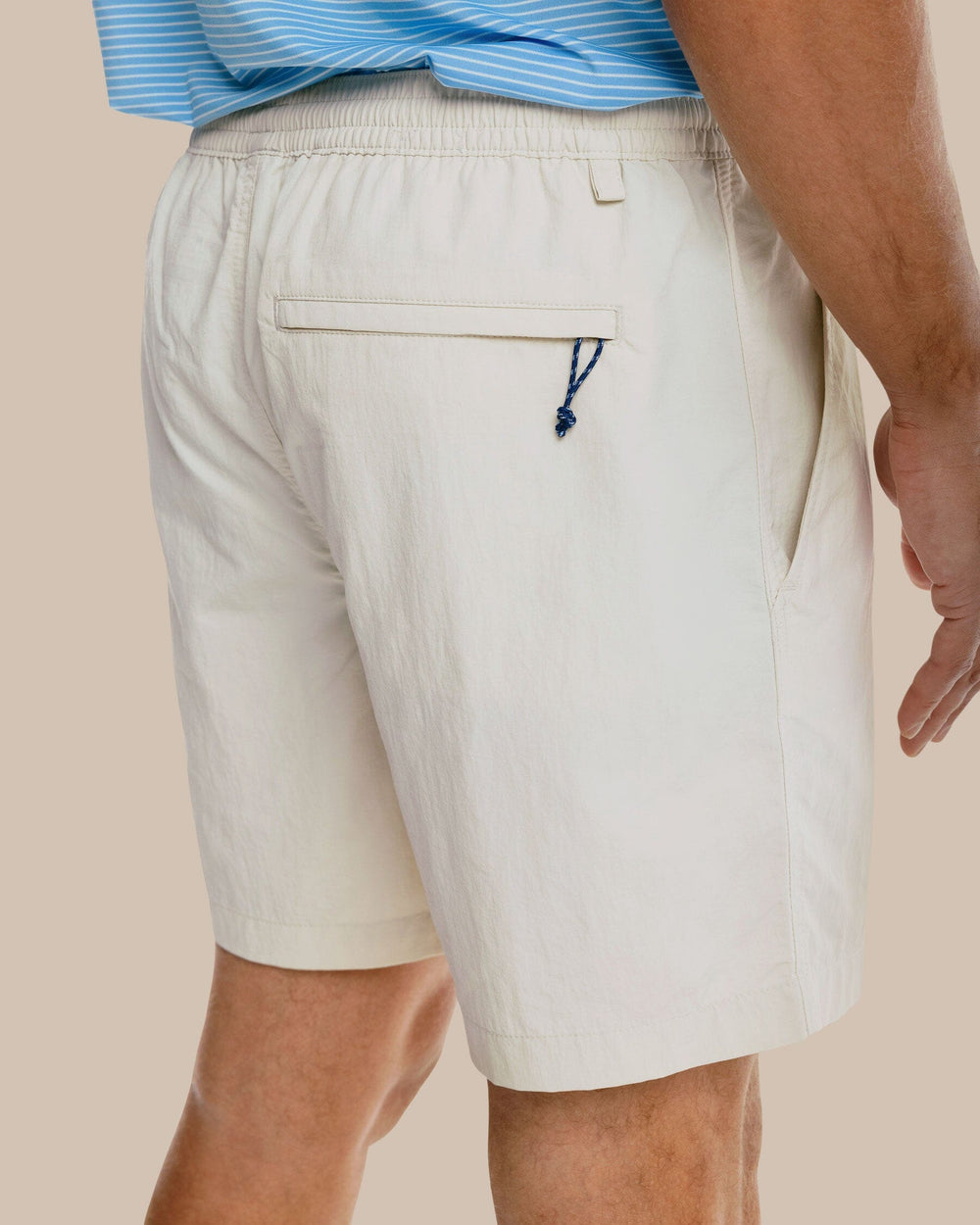 The model side model view of the Men's Shoreline 6 Inch Short by Southern Tide  - Stone