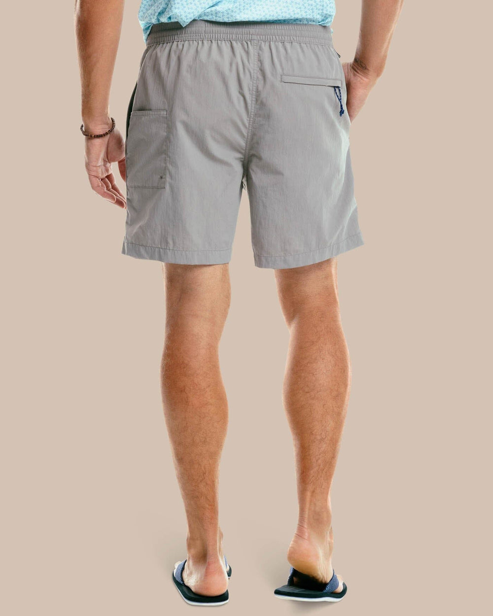 The model back view of the Men's Shoreline 6 Inch Short by Southern Tide  - Frost Grey