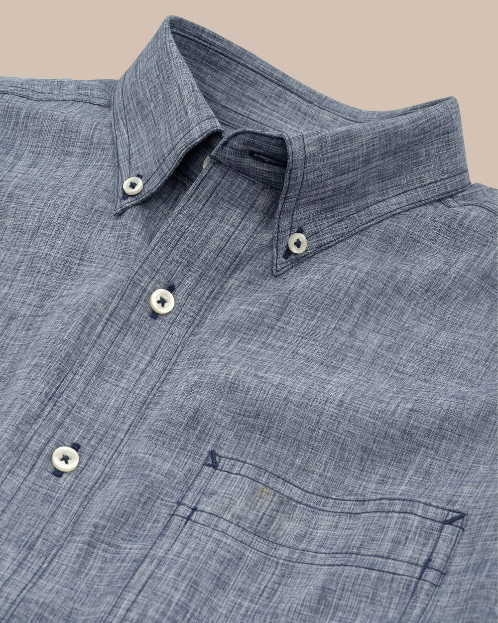 The detail of the Men's Navy Short Sleeve Dock Shirt by Southern Tide - Navy