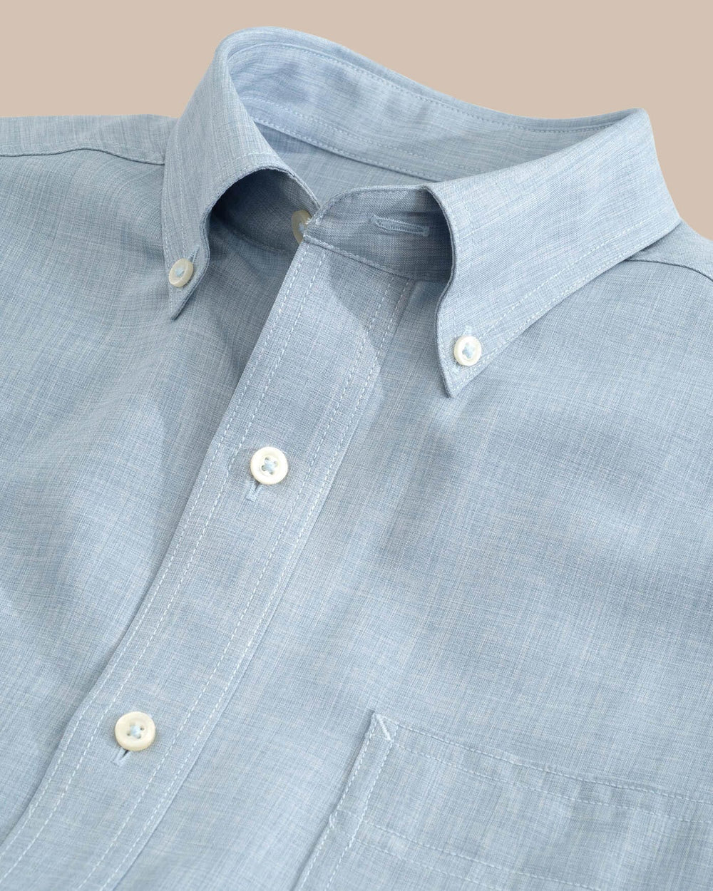 The detail of the Men's Grey Short Sleeve Dock Shirt by Southern Tide - Seagull Grey