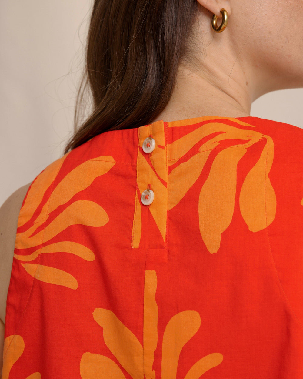 The back detail view of the Southern Tide Simone Leafy Luxe Printed Tank in Poppy Red by Southern Tide - Poppy Red