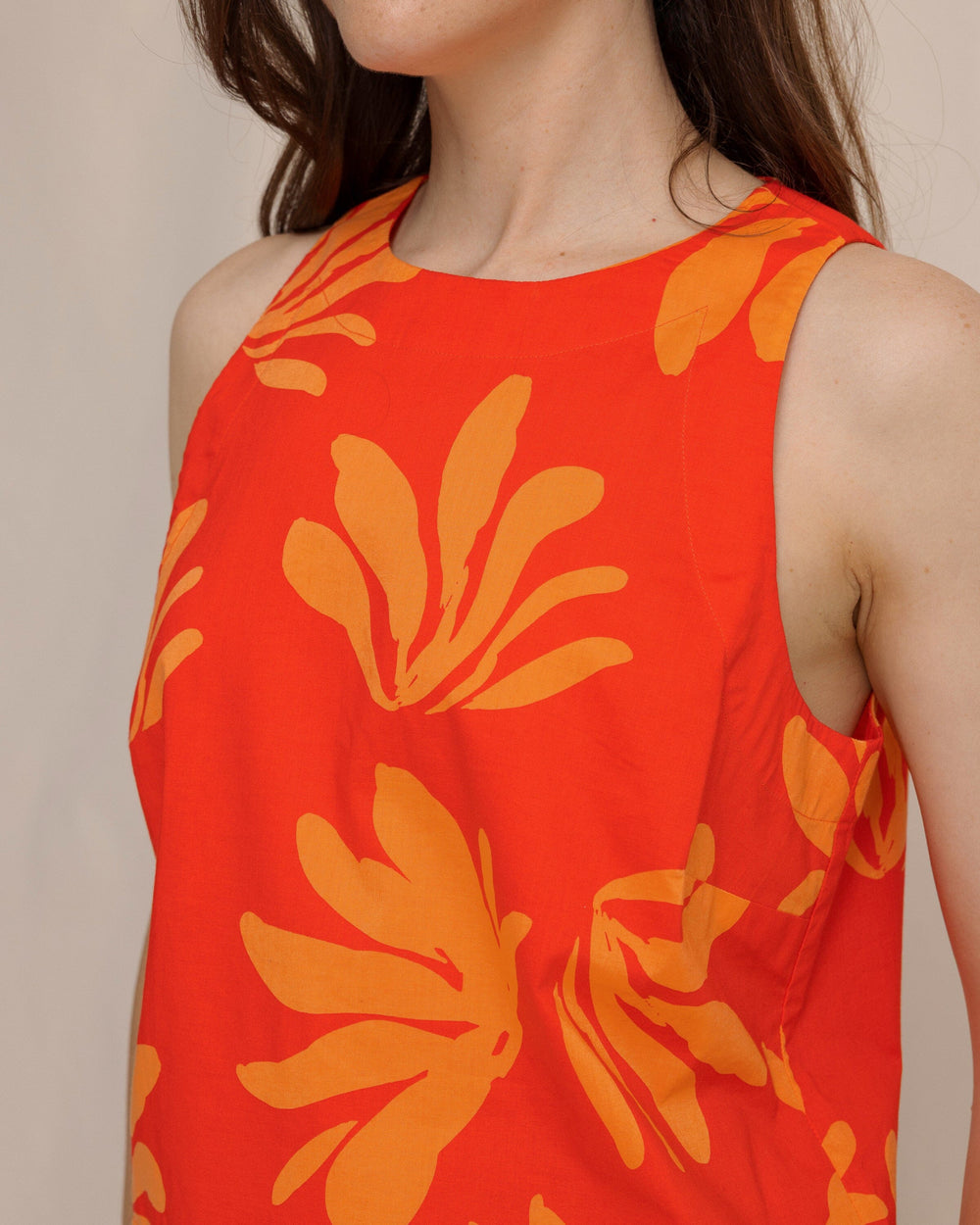 The front detail view of the Southern Tide Simone Leafy Luxe Printed Tank in Poppy Red by Southern Tide - Poppy Red